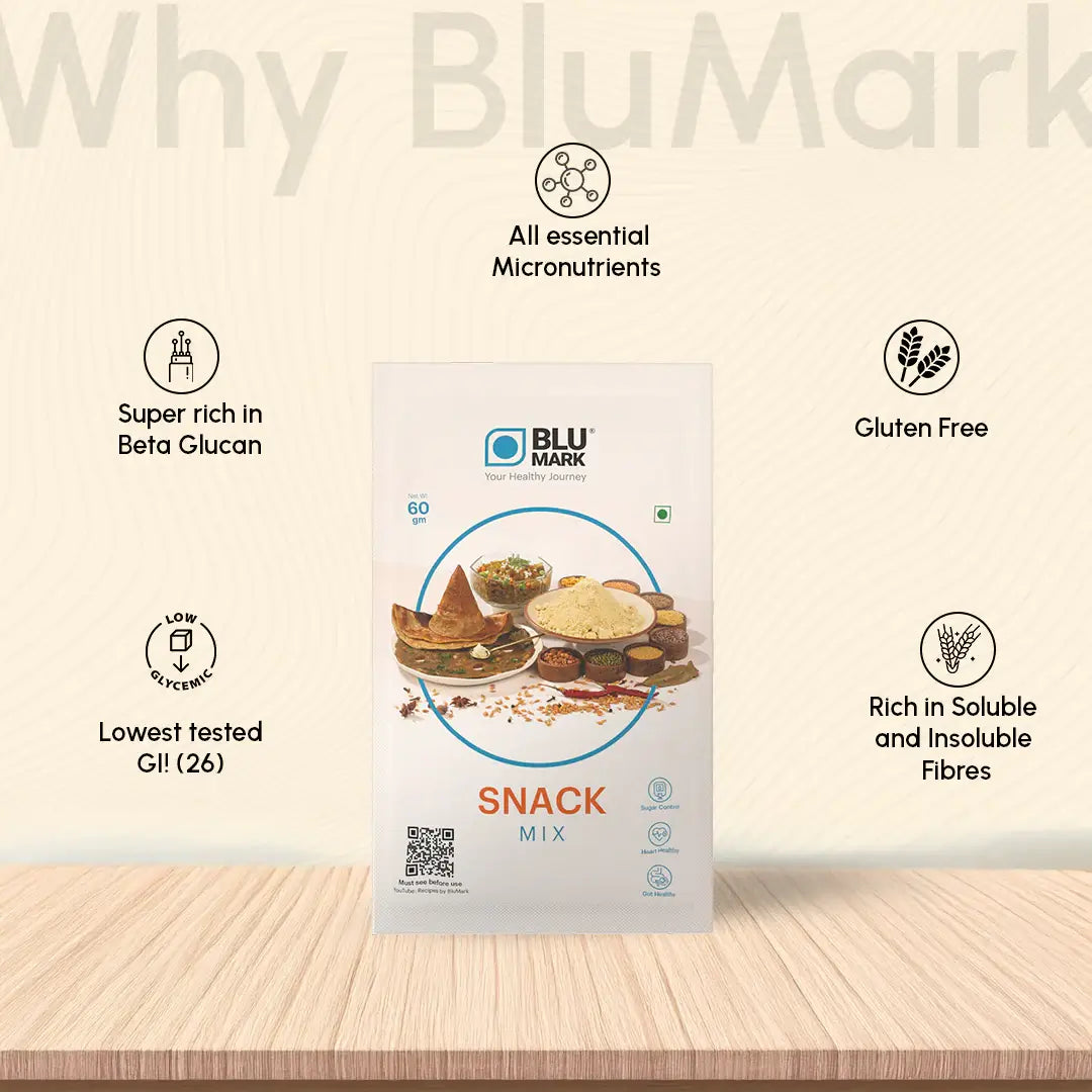 BluMark snack mix package on a wooden surface with product features listed.