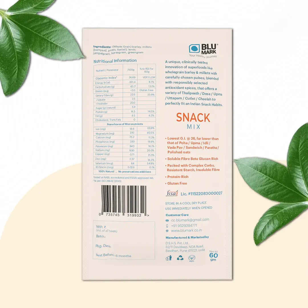 Back of a snack mix package with nutritional information and branding on a beige background with green leaves.