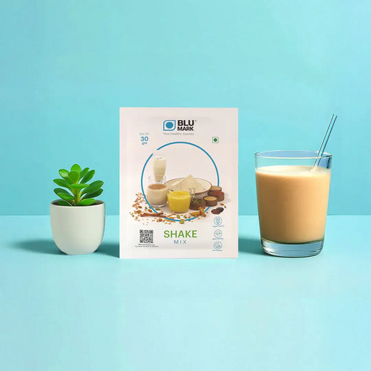 BLU MARK shake mix package with a glass of shake on a blue background